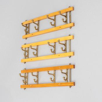 A set of three 'Dekorativ' coat hangers, Skoglunds metallgjuteri, Anderstorp, 1950s/60s.