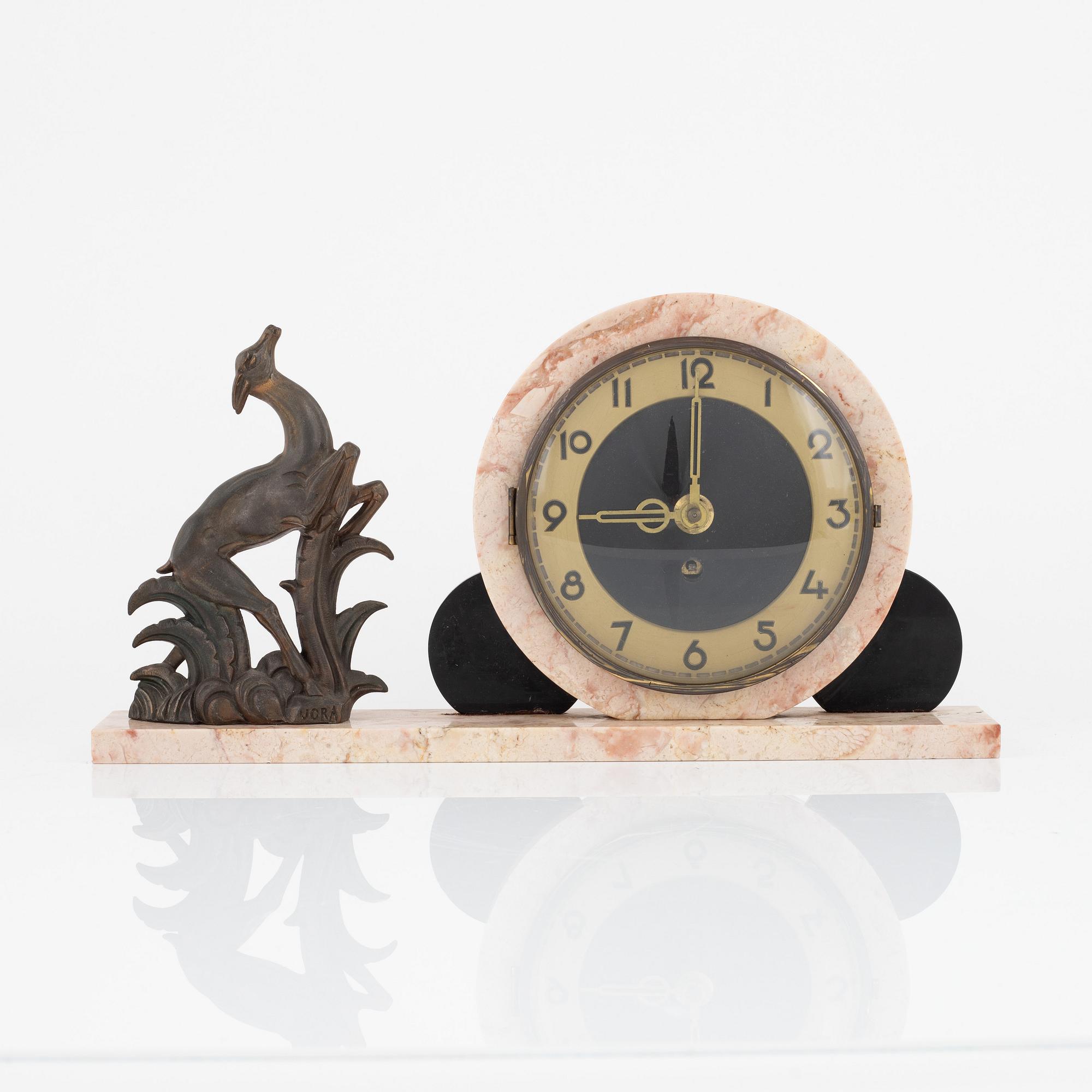 A 3-piece Art Deco mantel clock set, Ucra, France, 1930's.
