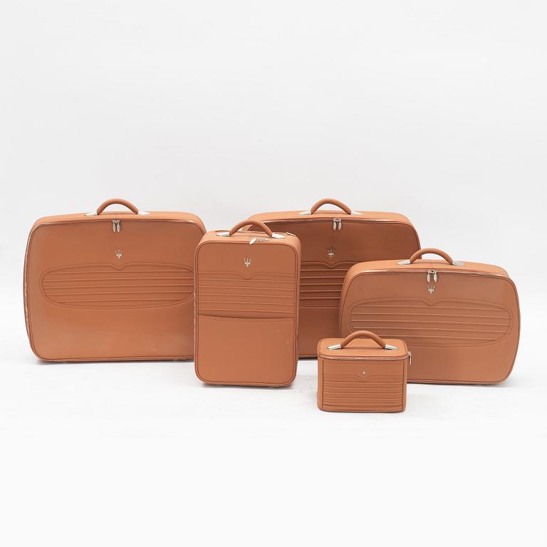 Maserati, five pieces of 'Quattroporte' leather luggage.