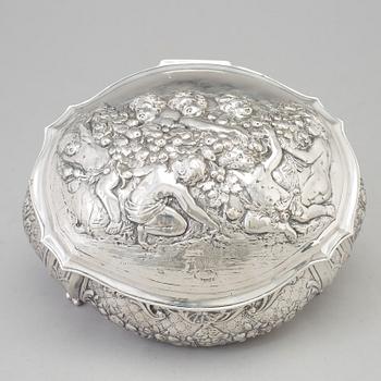 A silver sugar box, early 20th century.