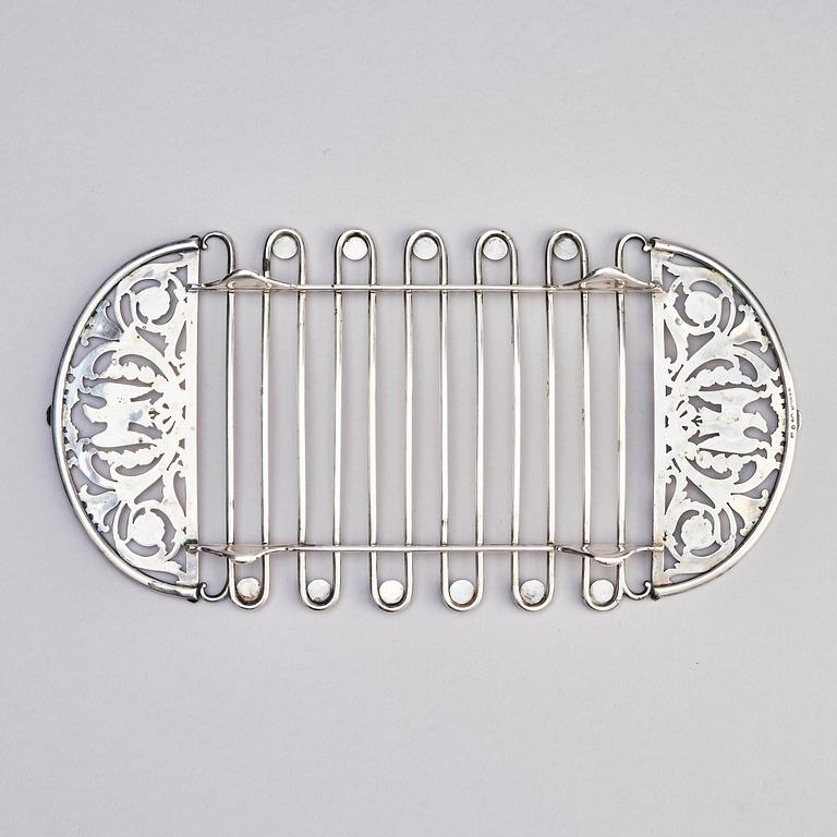 A silver asparagus cradle by W.A. Bolin, Moscow 1912-17.