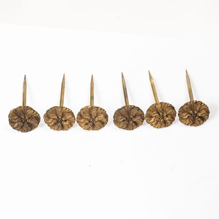 Twelve curtain tiebacks, 19th Century.