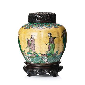A melon shaped jar decorated with the eight immortals, 17th Century.