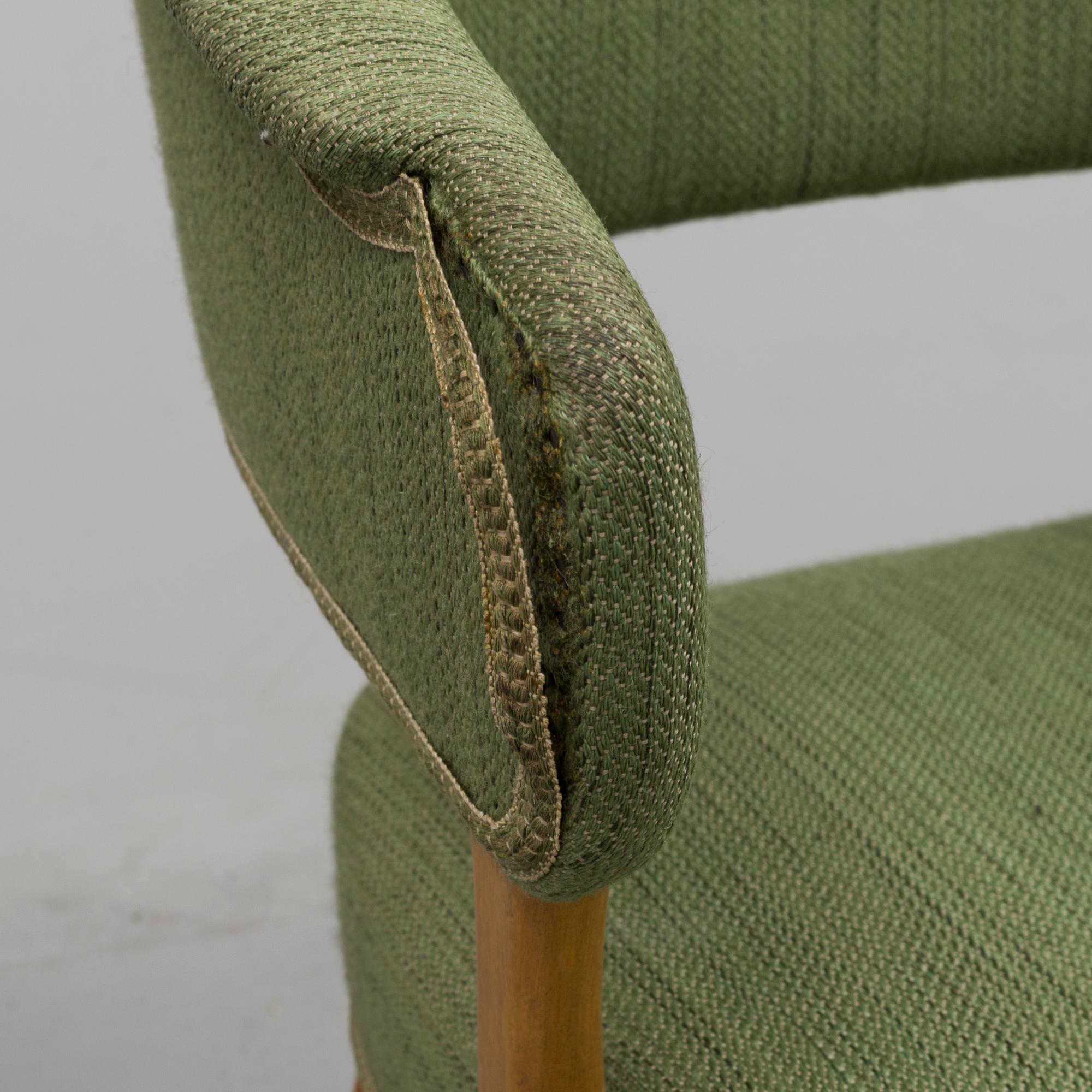 A "Lata Greven" armchair by Carl Malmsten.