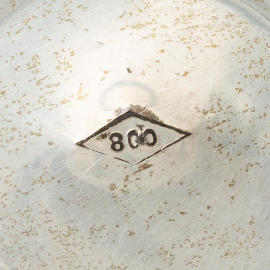 Two pierced silver bowls and two sugar spoons, including Sweden and Endland, 20th century.