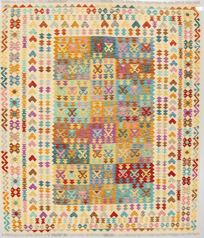 A CARPET, kilim, ca 297 x 259 cm.