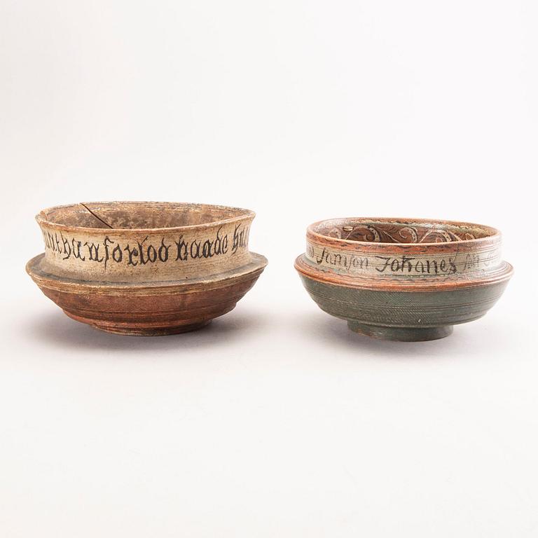 A pair of painted Norwegian wooden bowls one dated 1814.