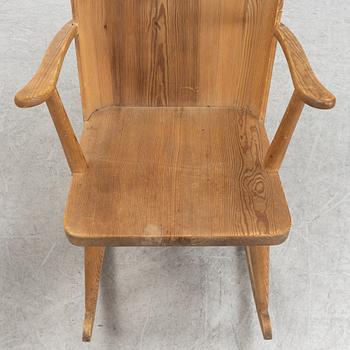 Göran Malmvall, a set of four pine chairs and a rocking chair, Svensk Fur, mid 20th Century.