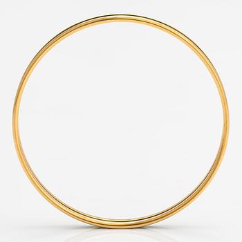 Hermès, a bracelet made of gold coloured metal and green enamel. Marked Hermès Paris, Made in France.