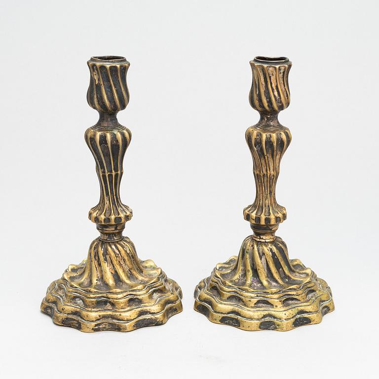 A pair of Louis XV argent haché candlesticks, France 18th-century.