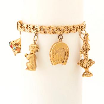 Bracelet with Bismarck chain and charms.