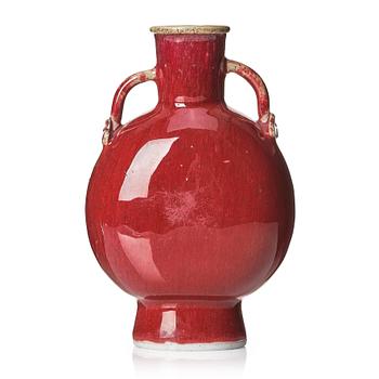 A sang de boef glazed moon flask, Qing dynasty, circa 1900.