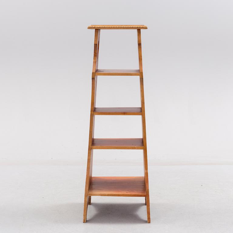 An early 20th century art nouveau shelf.