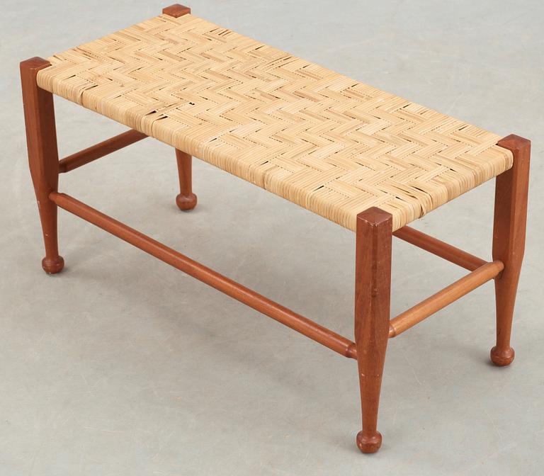 A Josef Frank mahogany and rattan bench, Svenskt Tenn, model 2009.