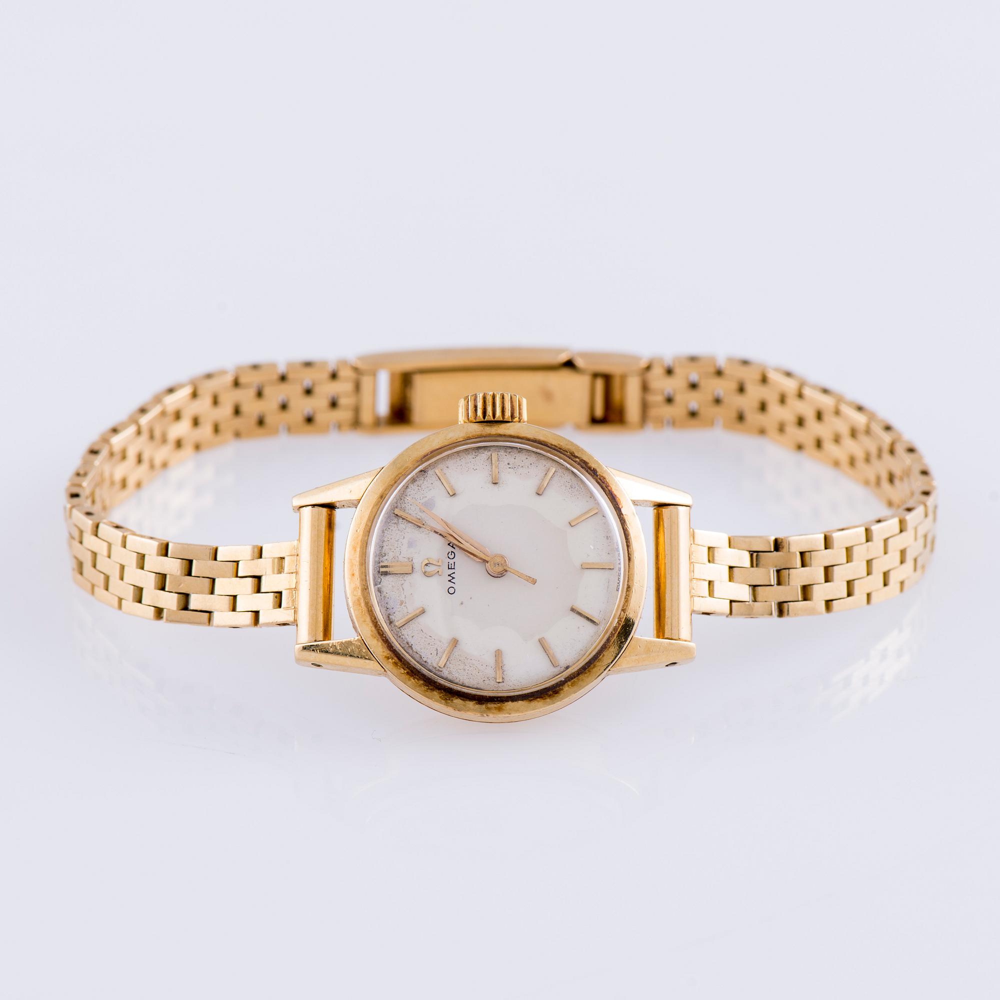 ARMBANDSUR, dam, Omega, guld. 1950-tal. Vikt tot. 29 g.