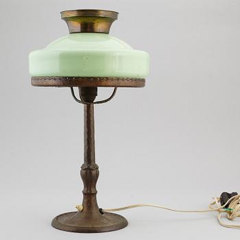 An copper table light, first half of the 20th century.