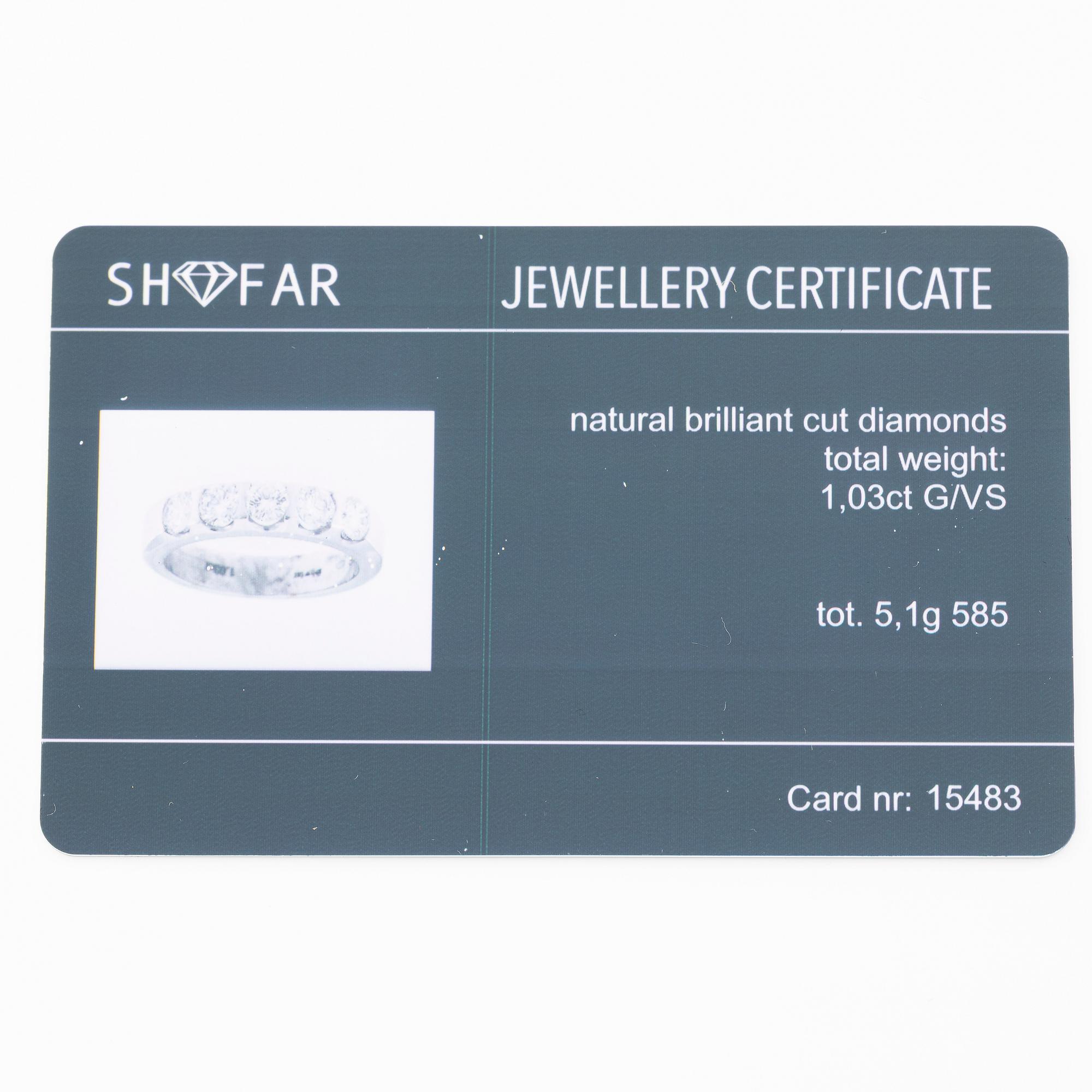Half eternity ring in 14K white gold set with brilliant-cut diamonds.