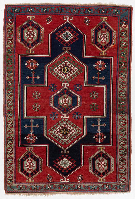An antique Kazak rug, South Caucasus, c 212 x 147 cm.