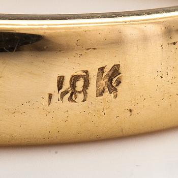 An 18K gold ring with tourmalines. Finland 2002.