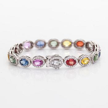 A multi-colour sapphire and diamond bracelet in 14K whitegold.