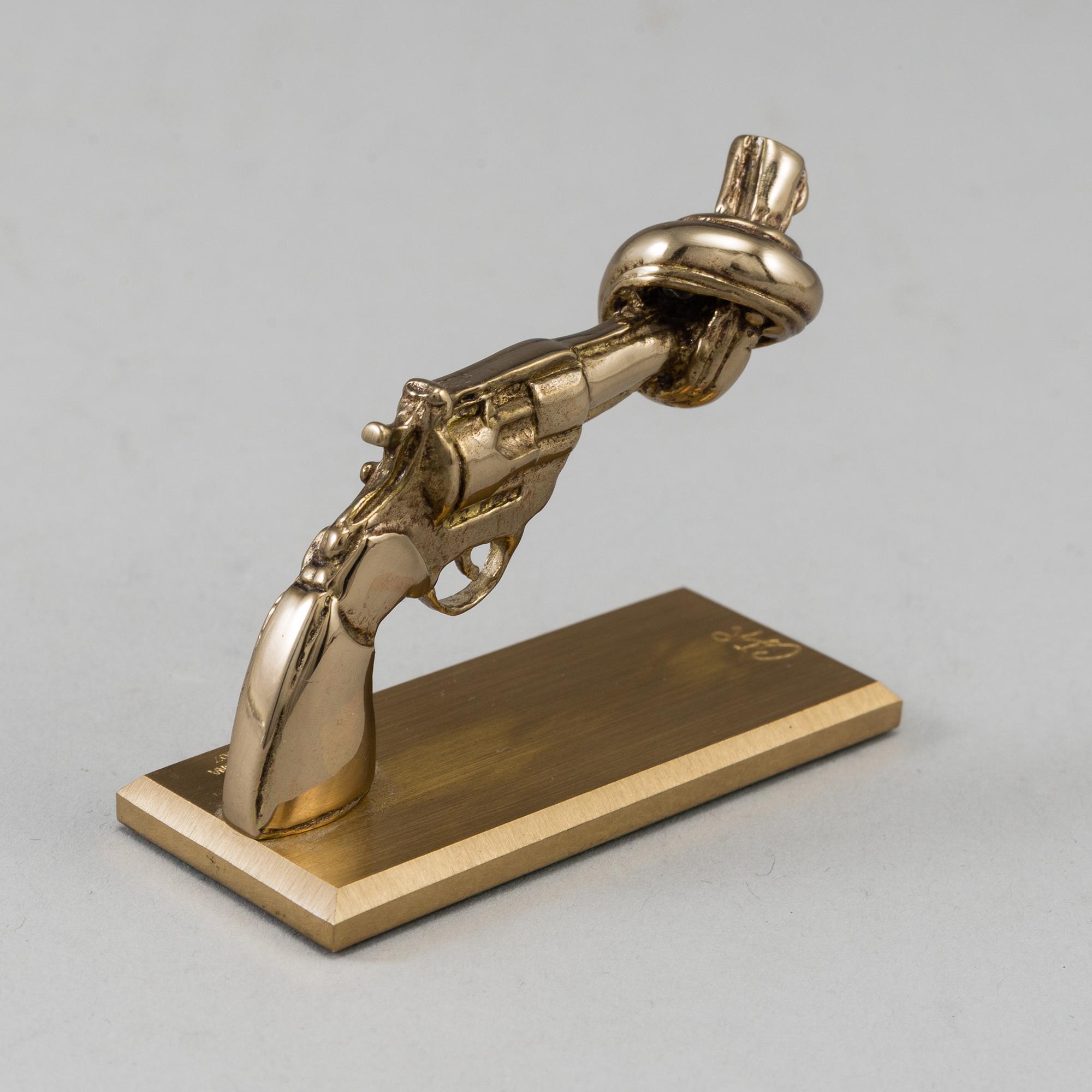 CARL FREDRIK REUTERSWÄRD, a brass 'Non Violence' sculpture from Skultuna.