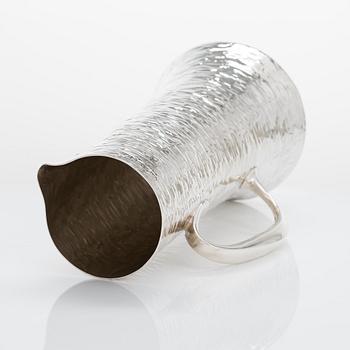 Tapio Wirkkala, a silver pitcher with six silver beakers, marked TW, Kultakeskus, Hämeenlinna Finland 1973 and 1966.