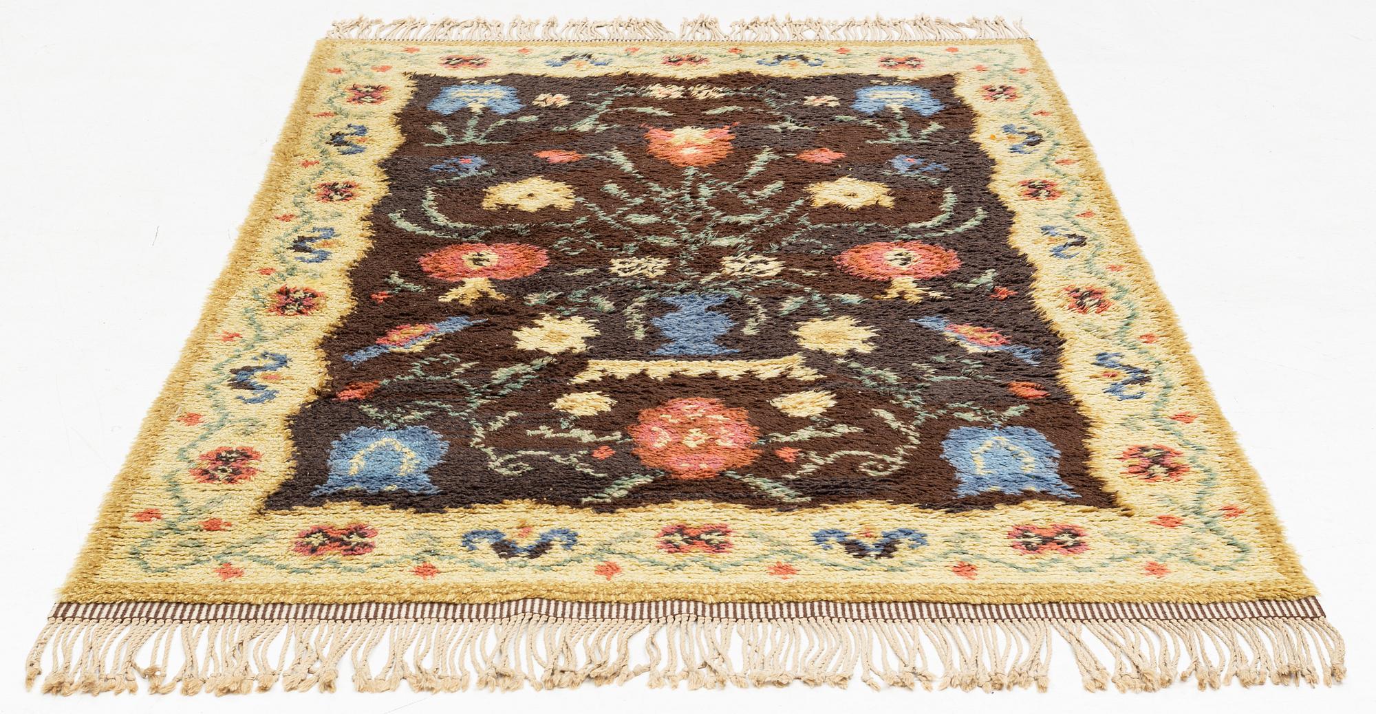 A rug, c. 235 x 155 cm.