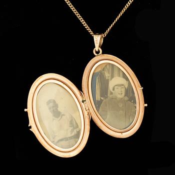 MEDALJONG OCH HALSKEDJA, 18k guld. GD&Co, Malmö, 1945. Vikt 14,6g.
