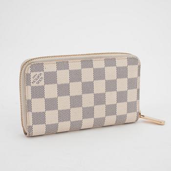 LOUIS VUITTON, a damier azur wallet.