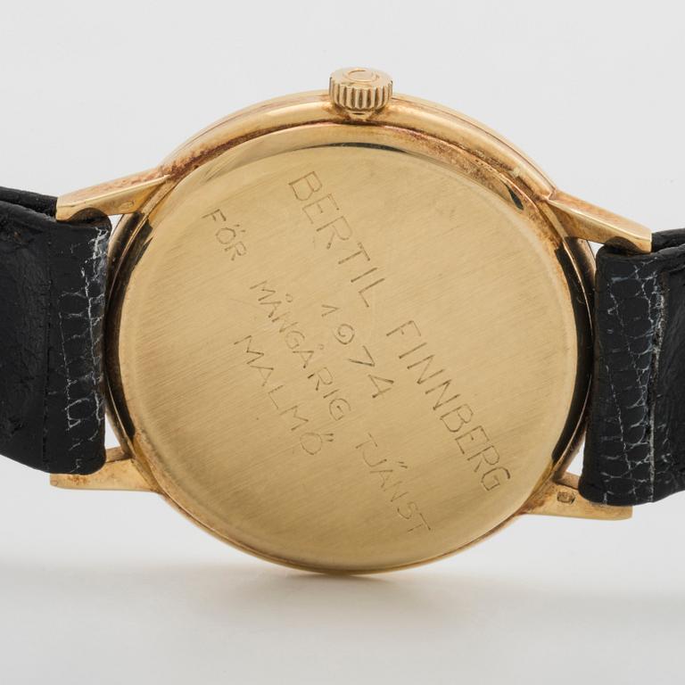 A 14 ct gold Omega Geneve wrist watch.