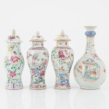 A set of three famille rose vases with covers and a bottle, Qing dynasty, Qianlong (1736-95).