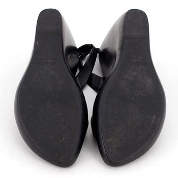 PRADA, a pair of black leather sandals. Size 37.