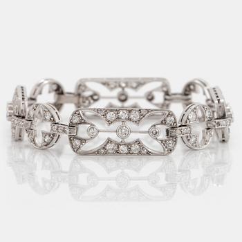 1041. A platinum bracelet set with old- and eight-cut diamonds.