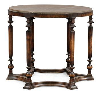 610. An Axel-Einar Hjorth stained birch 'Library' table with a limestone top by NK, Nordiska Kompaniet ca 1929.