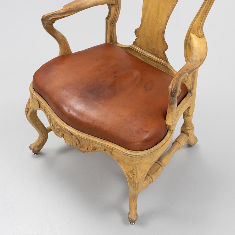 A Swedish painted and carved rococo armchair, later part of the 18th century.