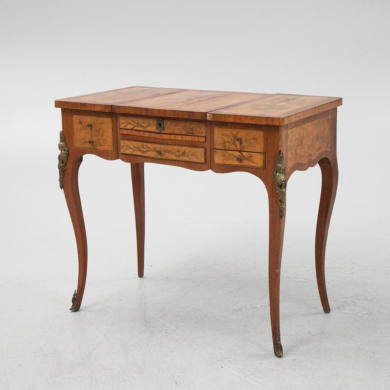 A Louis XV style dressing table, early 20th Century.