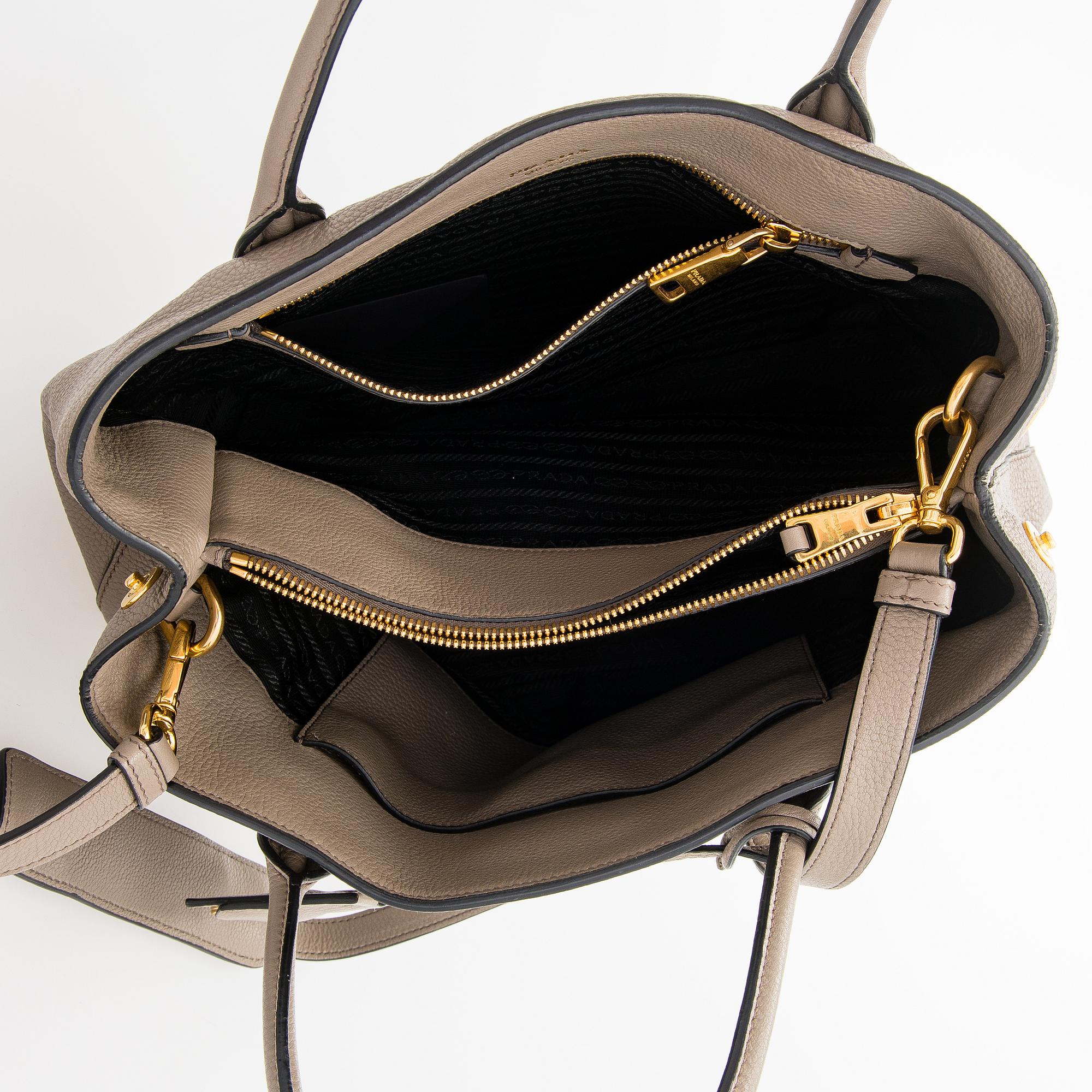 Prada, a clay gray leather handbag, 2020.