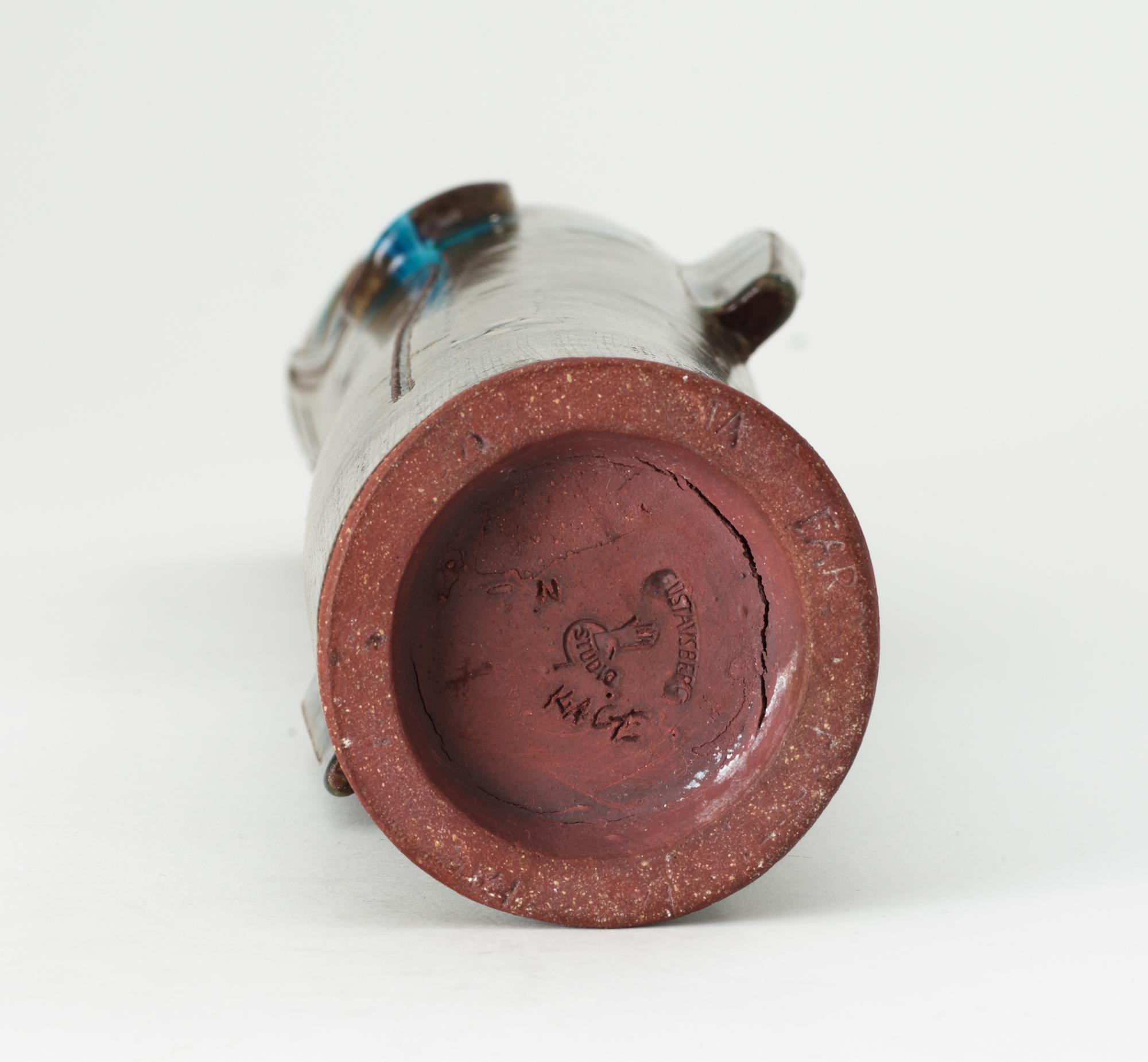 A Wilhelm Kåge 'Farsta' stoneware vase in the shape of a 'dragon fish', Gustavsberg studio 1955.