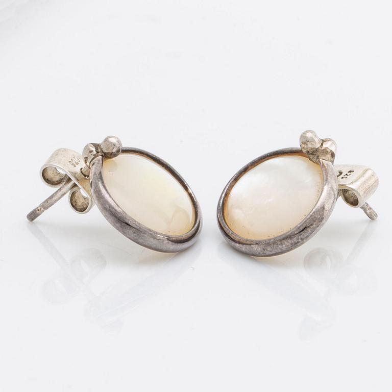 Vivianna Torun Bülow-Hübe bangle and earrings sterling silver, 1 moonstone and mother of pearl, signed Torun sterling.