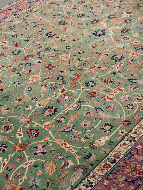 A carpet, a semi-antique Tabriz, ca 374-376,5 x 268-276 cm.