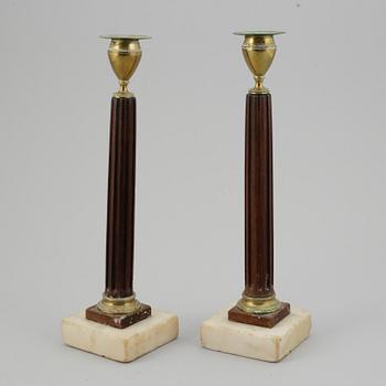 A pair of late Gustavian late 18th-century candlesticks.