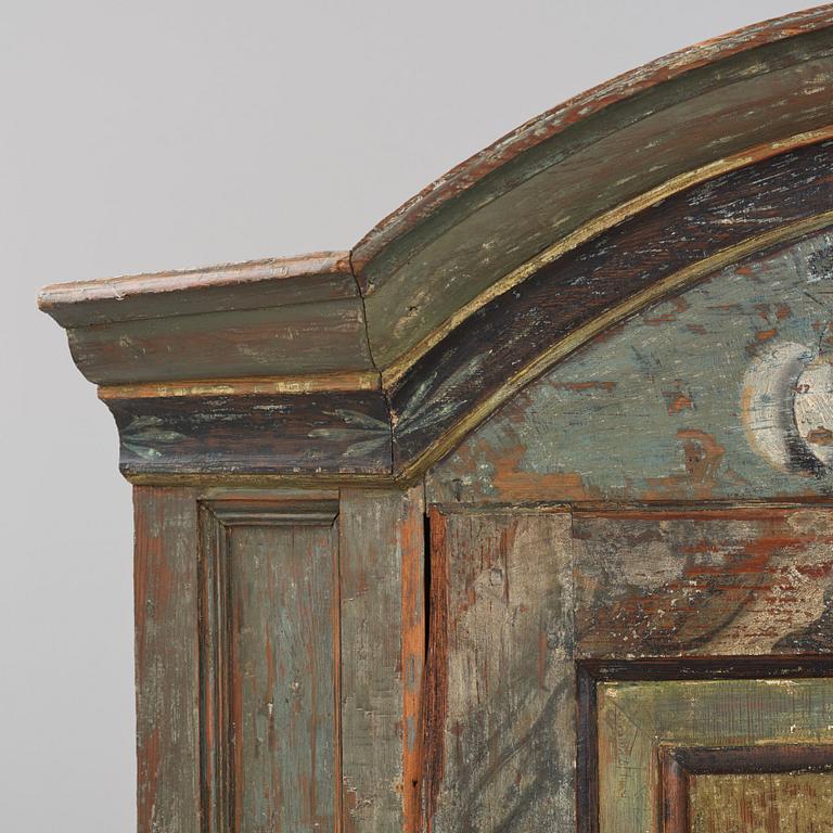 A Swedish polychrome-painted corner cabinet attributed to J. Bäckström (1773-1837).