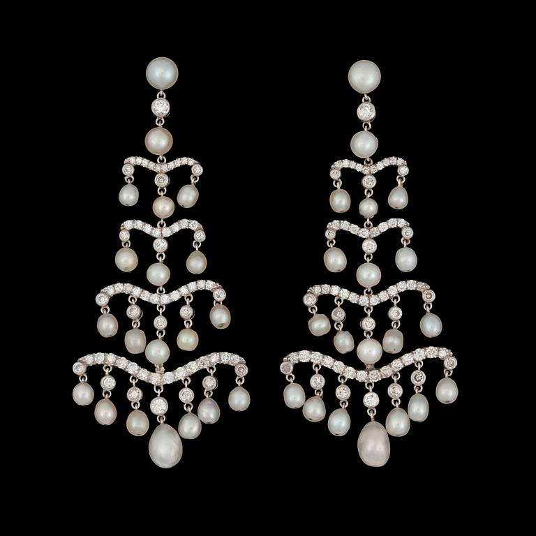 A pair of natural saltwater pearl and diamond earrings. Total carat weight on diamonds circa 2.30 cts.