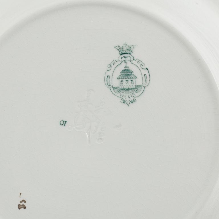 A 124-piece creamware dinner service, "Wexiö guld", Gustavsberg, Sweden, around 1900.