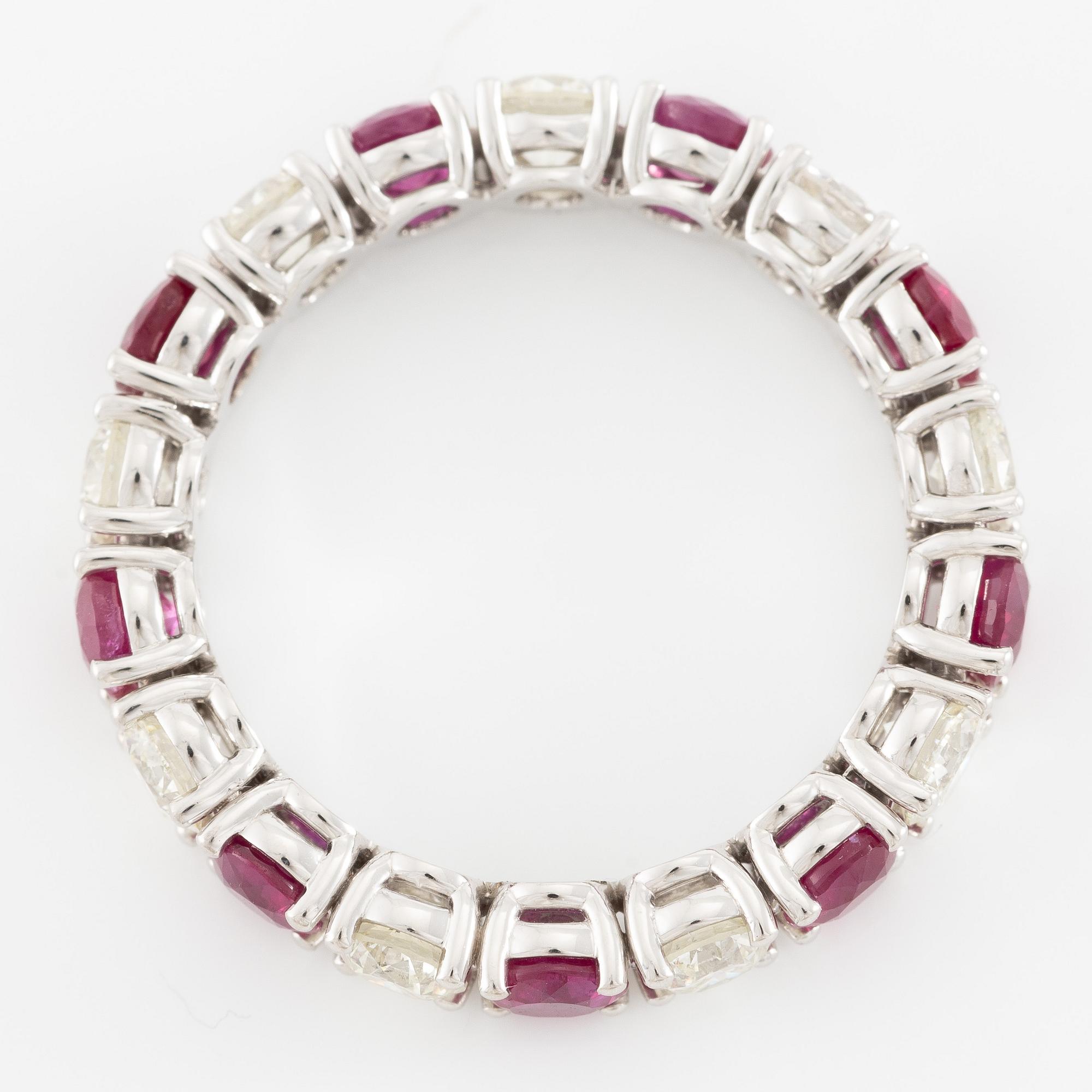 Ring, full eternity band, 18K white gold set with rubies and brilliant-cut diamonds.