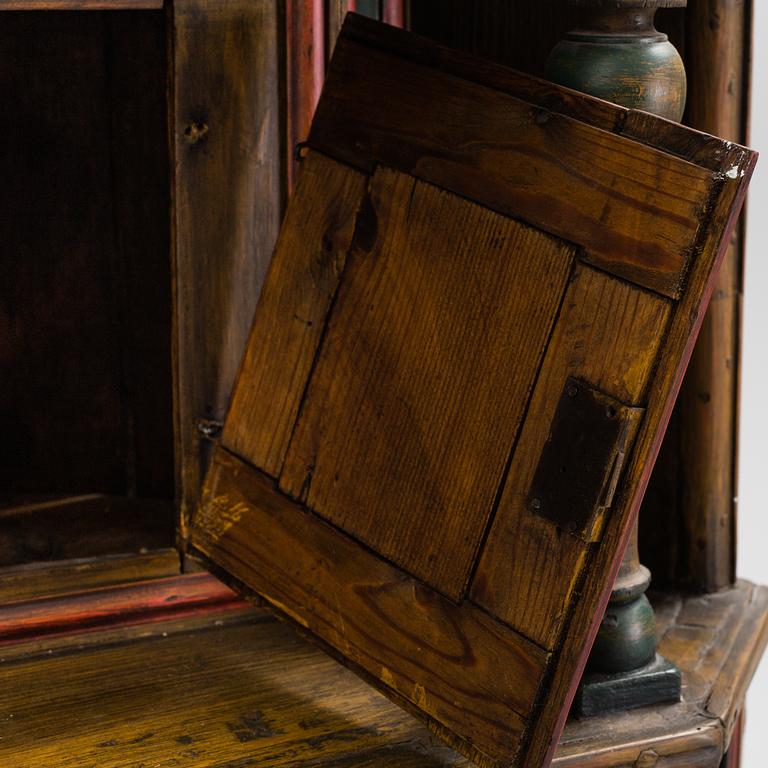 A 18th century corner cabinet.