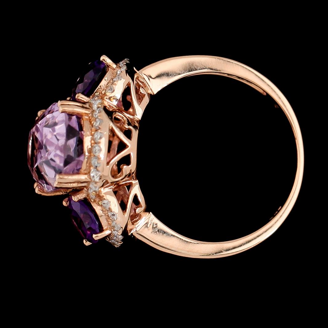 RING, 18K roséguld, rosa kunzit ca 5.70 ct, ametister tot ca 1.30 ct, diamanter tot ca 0.30 ct.
