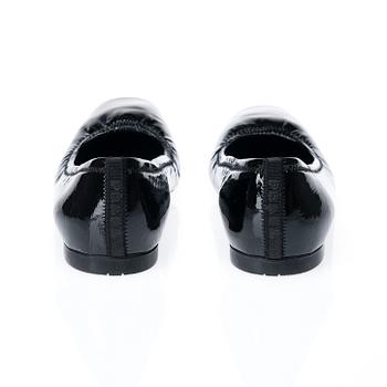 SKOR, Prada.