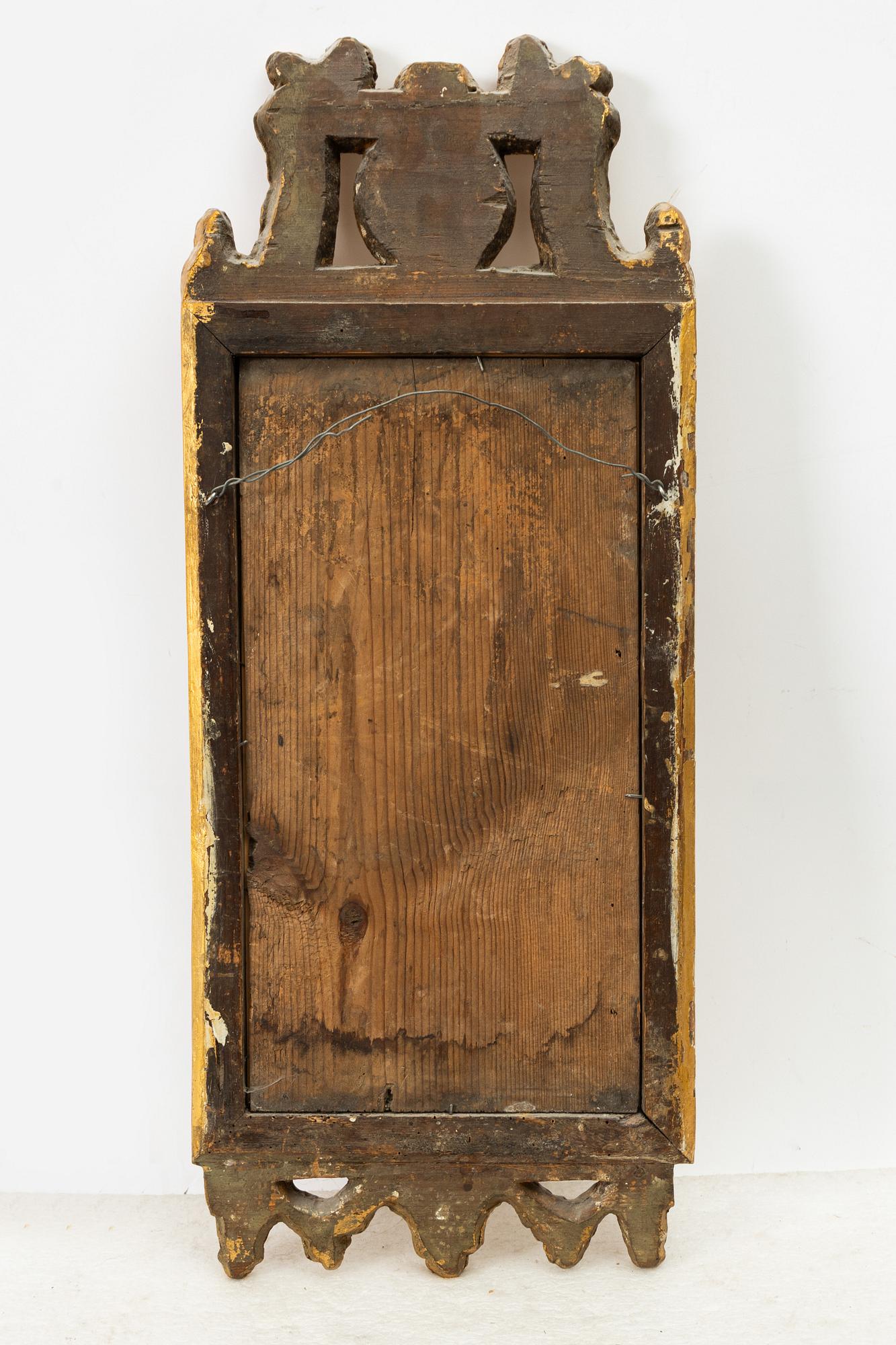 A Gustavian giltwood mirror, late 18th century.