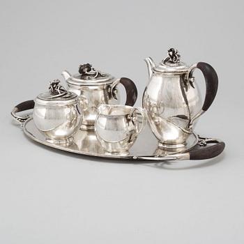 JÖRGEN JENSEN, a four pcs silver tea and coffee service with tray, Nordiska Kompaniet, Stockholm 1929.